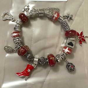 Handmade-NWOT-925 SS plated charm bracelet. Red lamp work beads variety charms